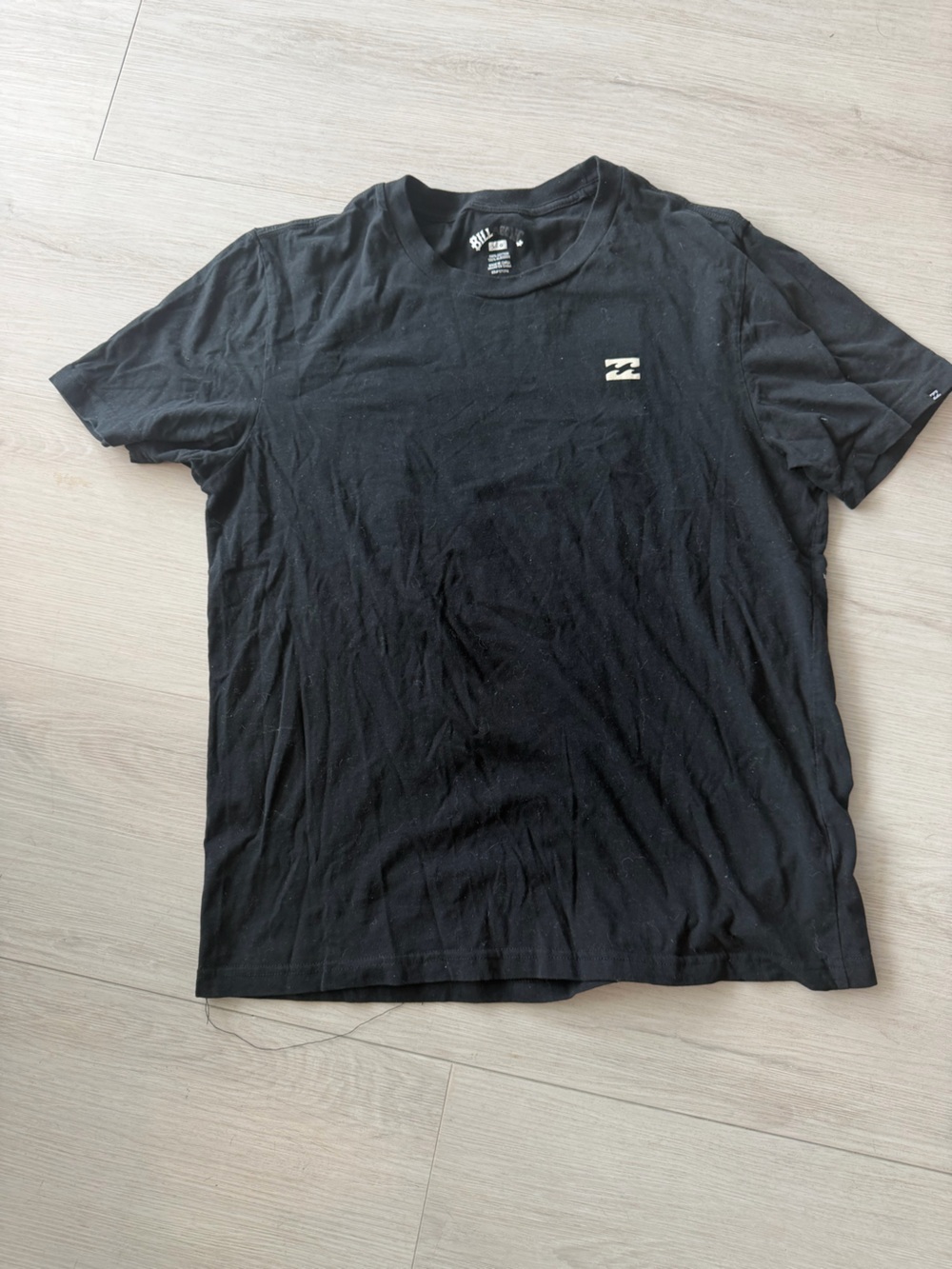 BNWOT Billabong 100% cotton.  Black Short-Sleeve Tee with Small Back Logo
